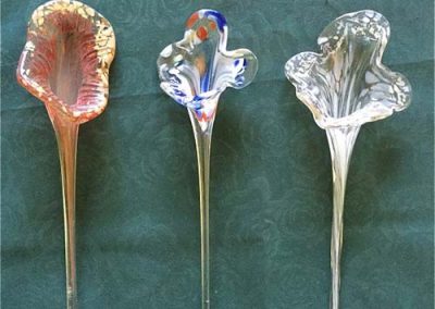 Blown glass flower containing ashes